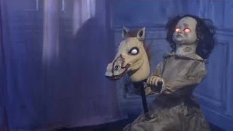 girl on rocking horse halloween