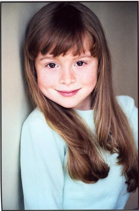 she voiced sally brown in  hes a bully, charlie brown