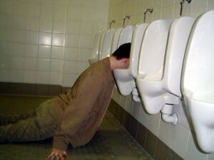 Drunk-man-in-urinal