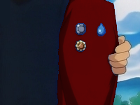 Drake mostrando medallas