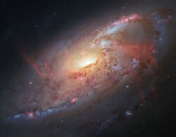 Messier 106 visible and infrared composite