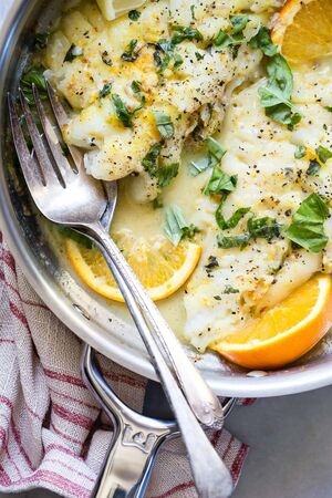 Pan fried citrus cod basil butter sauce