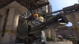 Wash holding a heavy machine gun turret