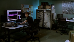 Sachi looks at Erickson, Perez and Hoffman as they enter the lab