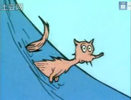 A fox watches the moment