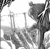 El titán colosal patea a Eren