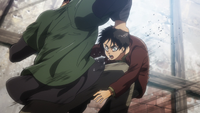 Eren is beaten by a man