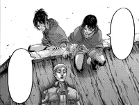 Hange and Levi sit with their fallen Commander and friend