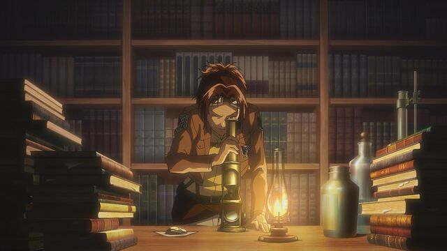 File:Hange examines an object.jpg