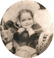 Clara Bow at three with a Teddy bear.