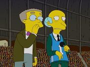 Smithers i Burns na stadionie