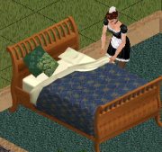 Maid making bed