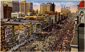 Mardi Gras on Canal Street postcard with Tudor Theater