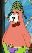 Patrick Wearing an Army Hat