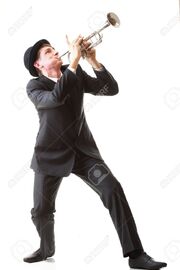Guy playing the trumpet