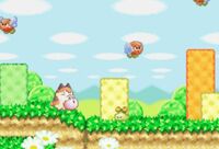 Kirby junto a varios Brontos en Kirby's Dream Land 3