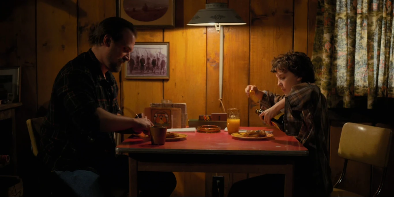 Image Hopper and El takes breakfast at the cabin.jpg Stranger