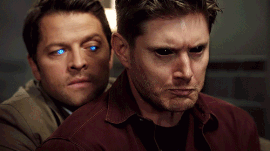 Castiel holds Dean