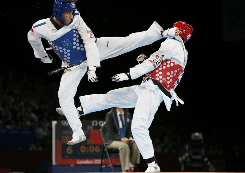 https://vignette.wikia.nocookie.net/taekwondo/images/1/18/WTF_sparring.jpg/revision/latest?cb=20140608221158