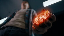 Matteusz holds the rock