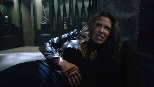 File:Jill-Wagner-Kate-shot-with-yellow-wolfsbane-Teen-Wolf-Season-6-Episode-20-The-Wolves-of-War.jpg