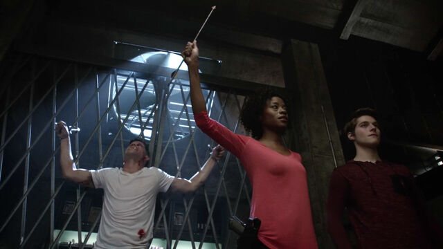 File:Charlie-Carver-Sibongile-Mlambo-Froy-Gutierrez-Ethan-Tamora-Nolan-Teen-Wolf-Season-6-Episode-19-Broken-Glass.jpg