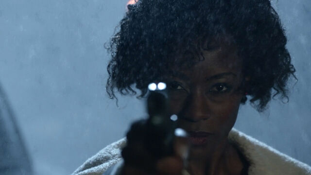 File:Sibongile-Mlambo-Tamora-Monroe-gun-Teen-Wolf-Season-6-Episode-19-Broken-Glass.jpg