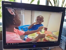 Yvette want some salad with her brother