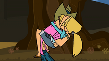 Geoff and Bridgette kissing