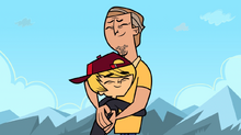 Father and son hug
