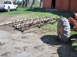 12 foot spring-tooth drag harrow