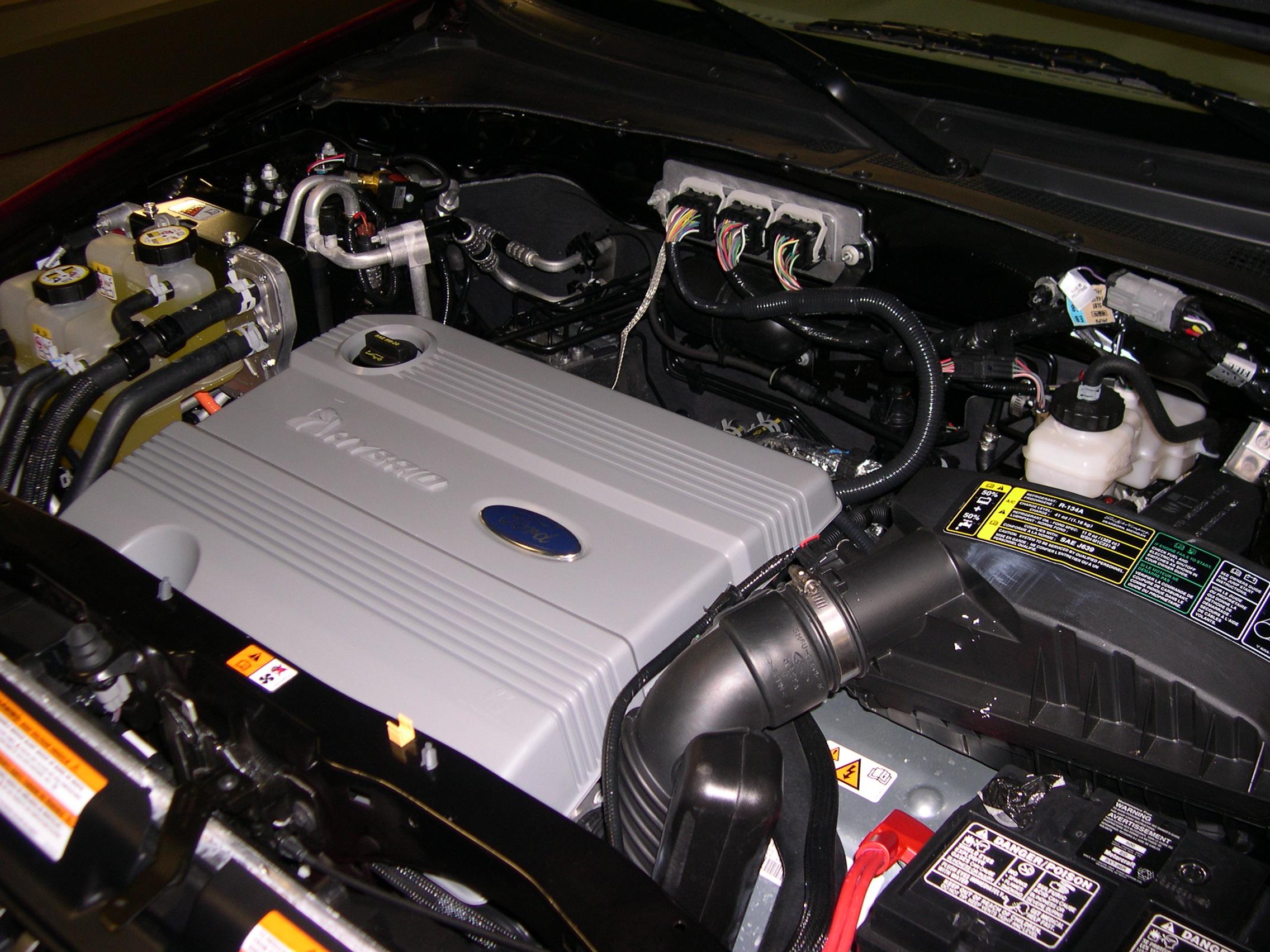 Engine compartment of a 2006 Mercury Mariner Hybrid.