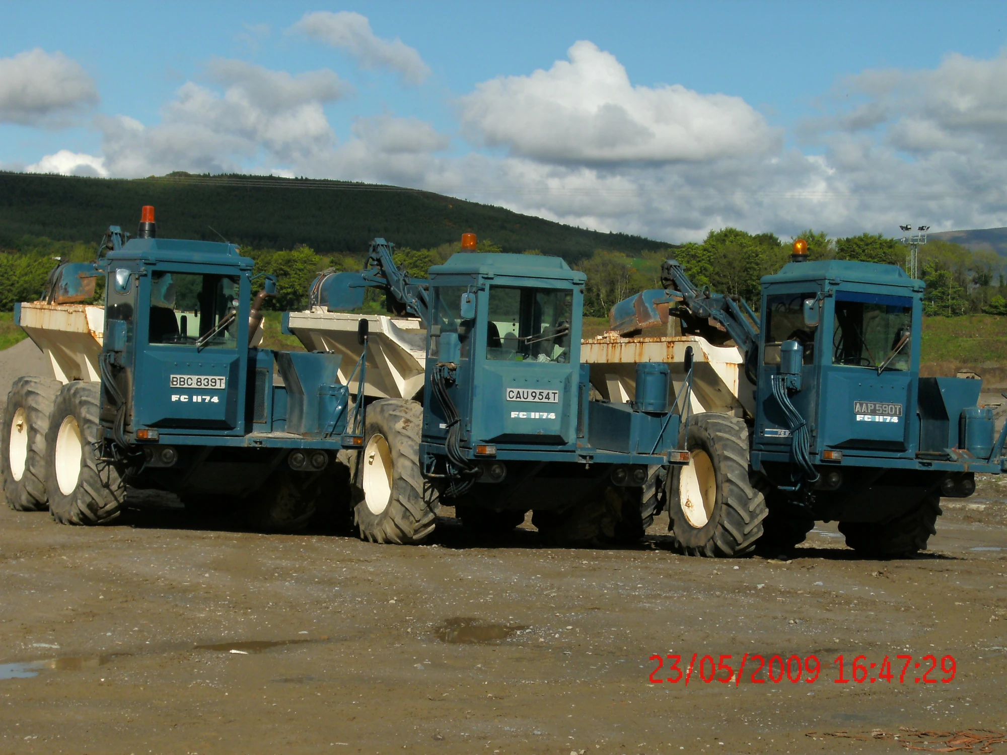County FC 1174 with self loading grabs and lime spreaders Tractor