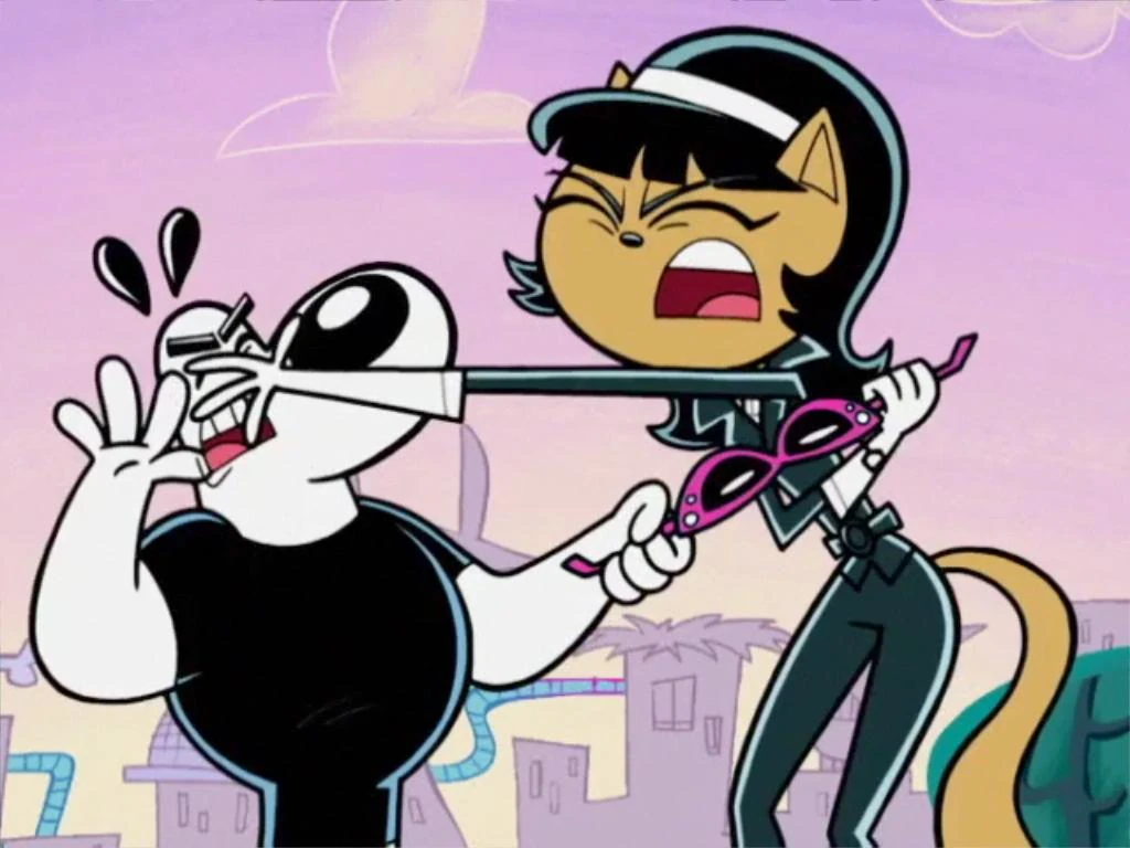 Image Dudley and Kitty fighting over the sun glasses.JPG T.U.F.F
