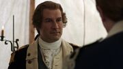 George Washington listens to Benjamin Tallmadge's suggestion to interrogate enemy prisoners