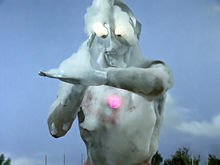 Ultraman red timer engulfed in foam
