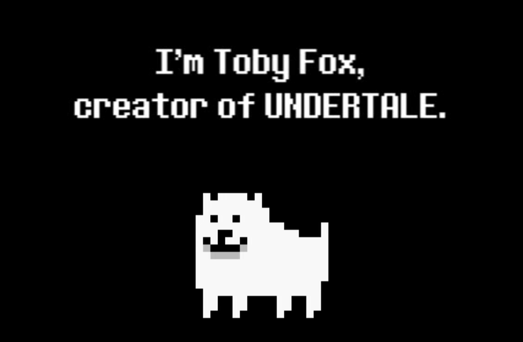 Тоби фокс игры. Тоби Фокс. Тоби Фокс Undertale. Создатель андертейл Тоби Фокс. Toby Fox надпись.