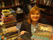 Cassandra Clare with books