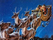 Santa in his sleigh and with his reindeer