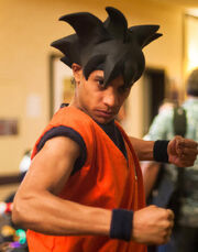 Goku-cosplay-jahlon-pose-arms-flexed
