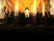 The golden man sitting on his throne