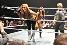 800px-Kaitlyn vs Natalya live event 2012 (cropped)