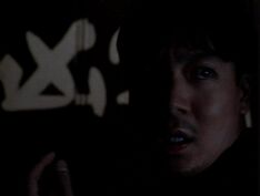 Johnny Lo with white symbol
