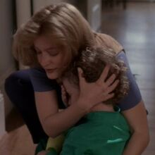 Trent held by Scully
