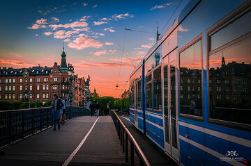 Djurgårdsbron, tram and a pink sunset