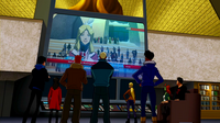 The Team watches the news