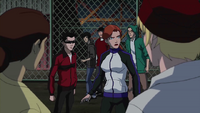 Batgirl and Robin infiltrate prisoners